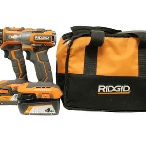 RIDGID DRILL SET WITH TWO BATTERIES CHARGER AND CARRYING BAG
